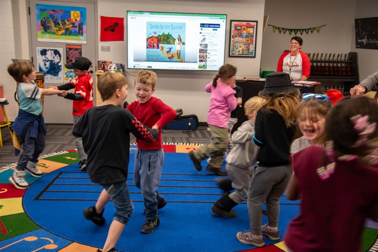  elementary students dance in music class